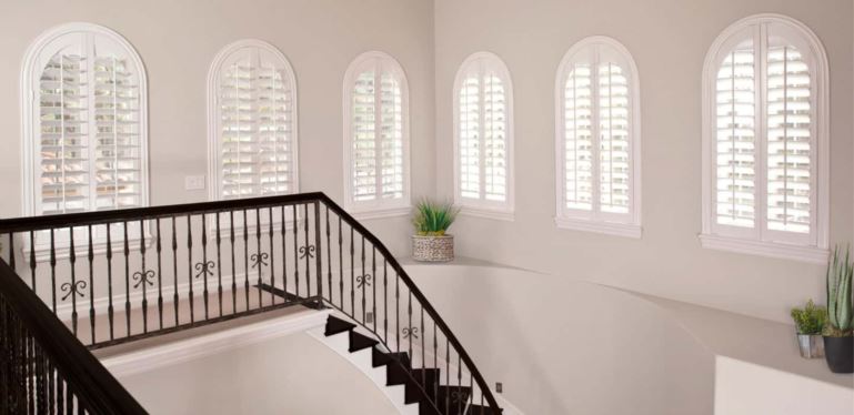Custom-made coverings cover your entire window and hang perfectly. Arched Plantation Shutters