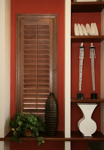 You can even coordinate your wood shutters with shelving. Salt Lake City wood shutter shelving